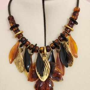 Elegant Gold Tone and Black Leaf Necklace